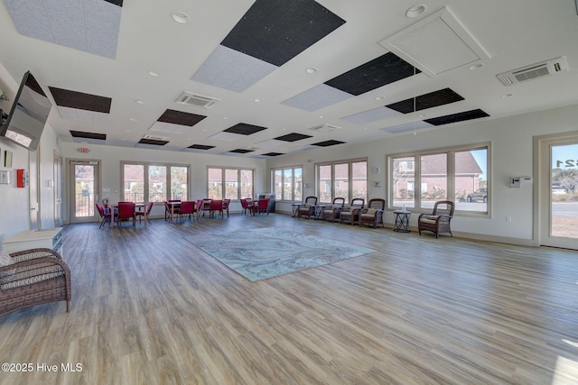 gym featuring light hardwood / wood-style flooring