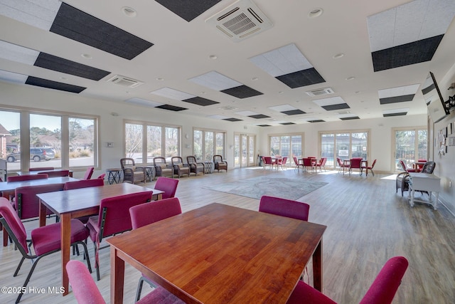 dining space featuring light hardwood / wood-style floors