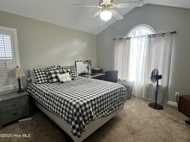 bedroom with carpet flooring, ceiling fan, and vaulted ceiling