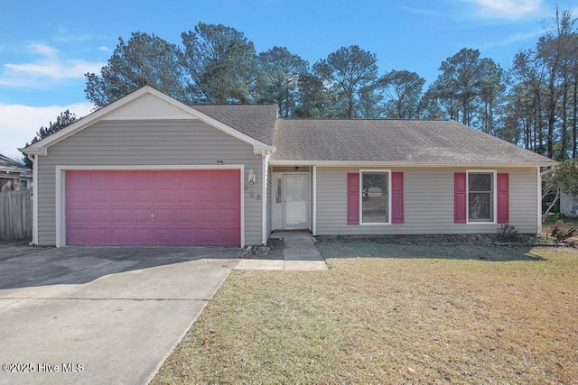 single story home with a garage and a front lawn