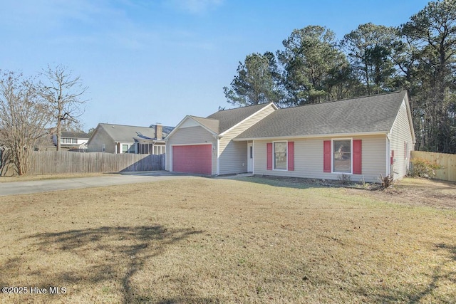 ranch-style home featuring a front lawn and a garage