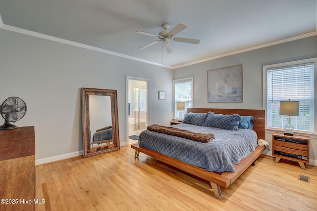 bedroom featuring ensuite bath, ceiling fan, light hardwood / wood-style floors, and ornamental molding