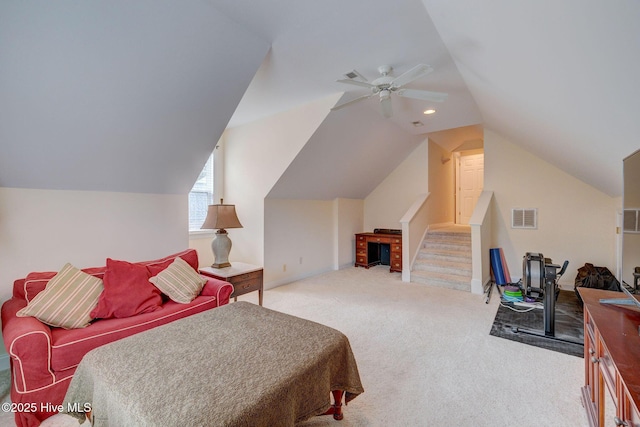 carpeted bedroom with ceiling fan and lofted ceiling