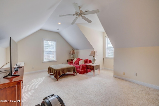 carpeted bedroom featuring ceiling fan, lofted ceiling, and multiple windows