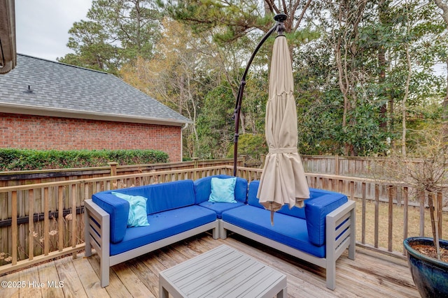 wooden deck featuring outdoor lounge area