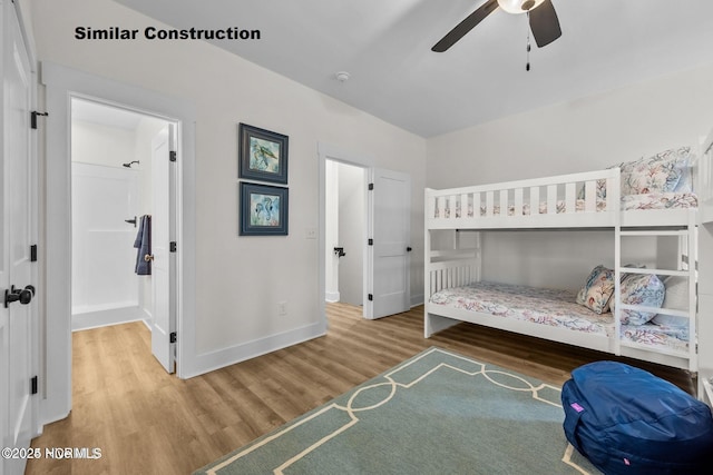 bedroom featuring hardwood / wood-style floors and ceiling fan