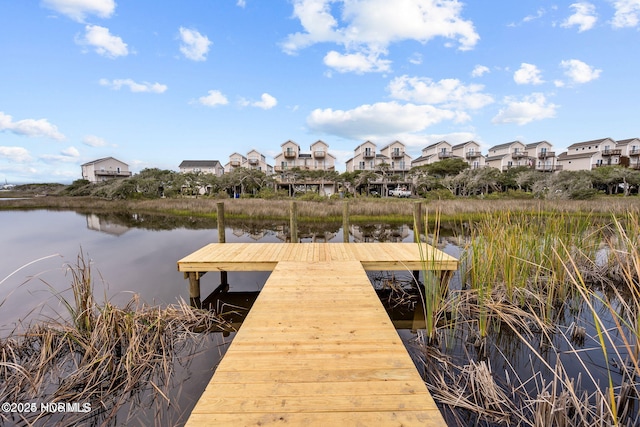 view of dock with a water view