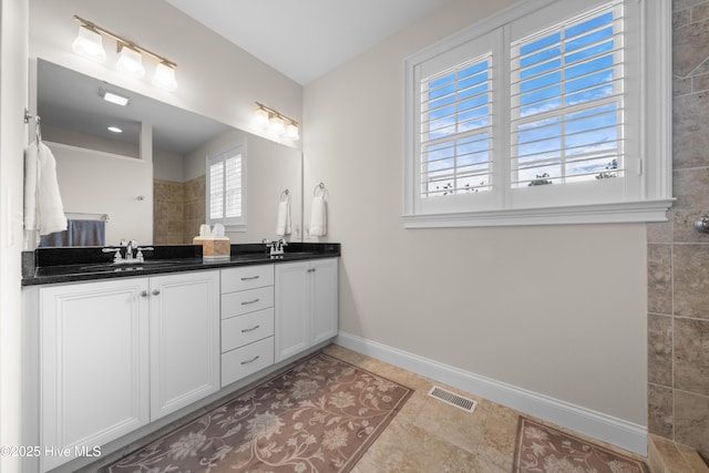 bathroom featuring vanity