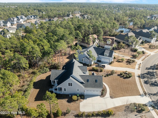 aerial view featuring a view of trees