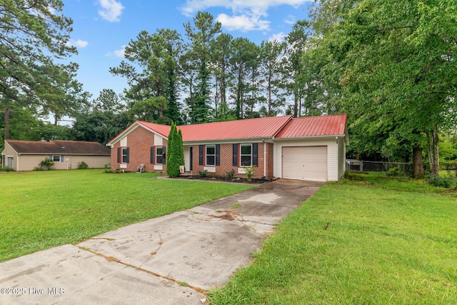 single story home featuring a garage and a front lawn