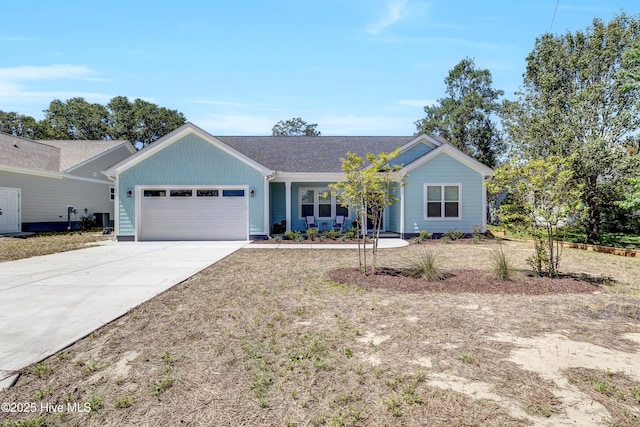 ranch-style home with a porch and a garage