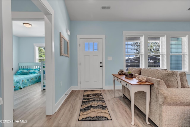 entrance foyer featuring light wood-type flooring