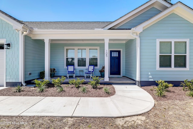 doorway to property with a porch