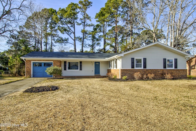 ranch-style home featuring a front yard and a garage