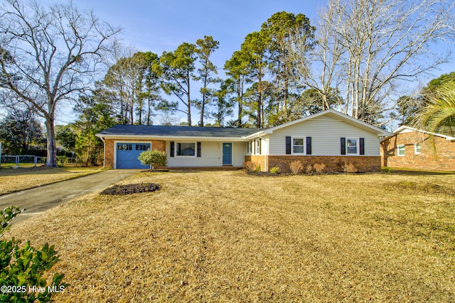 single story home with a front lawn and a garage