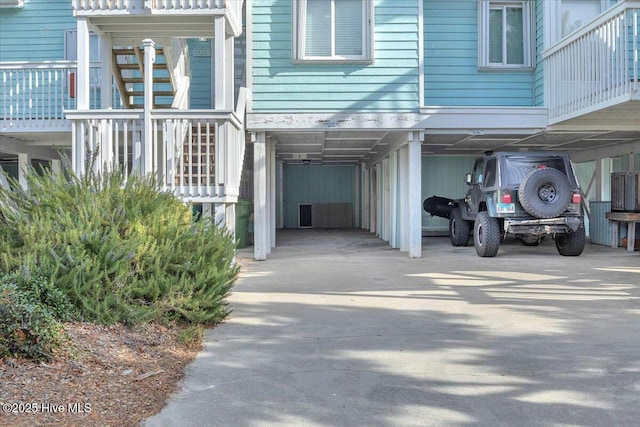 exterior space with a carport