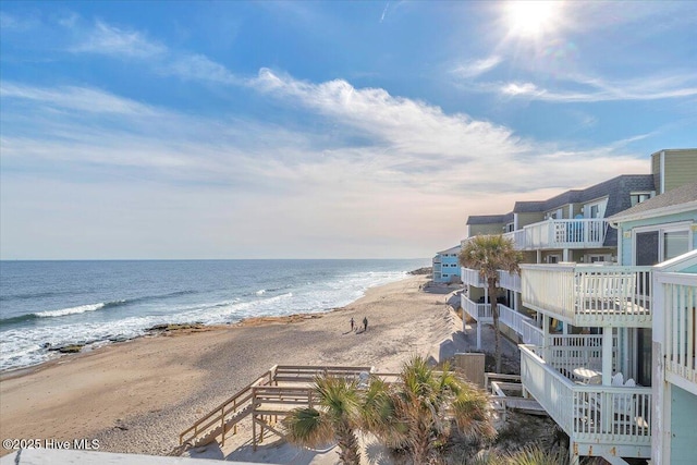 view of water feature with a beach view