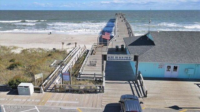 bird's eye view with a view of the beach and a water view