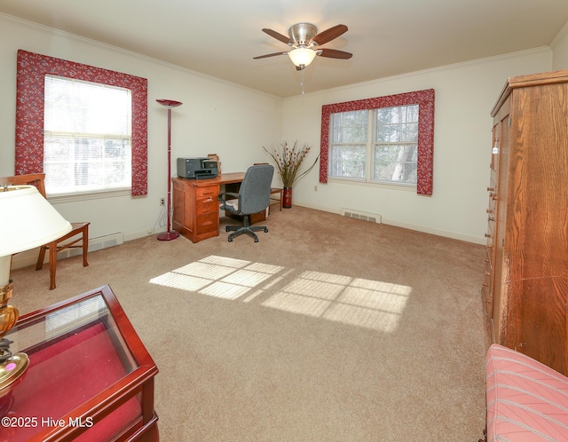 office area featuring crown molding, ceiling fan, and light colored carpet