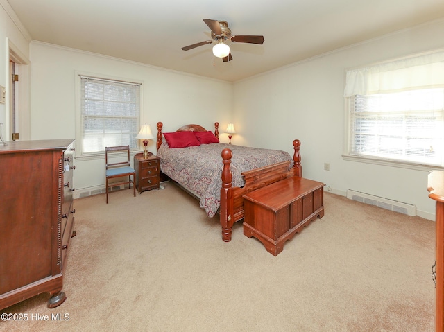 bedroom featuring ceiling fan, crown molding, and light carpet