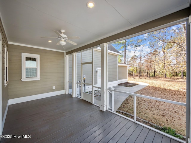 wooden terrace with ceiling fan