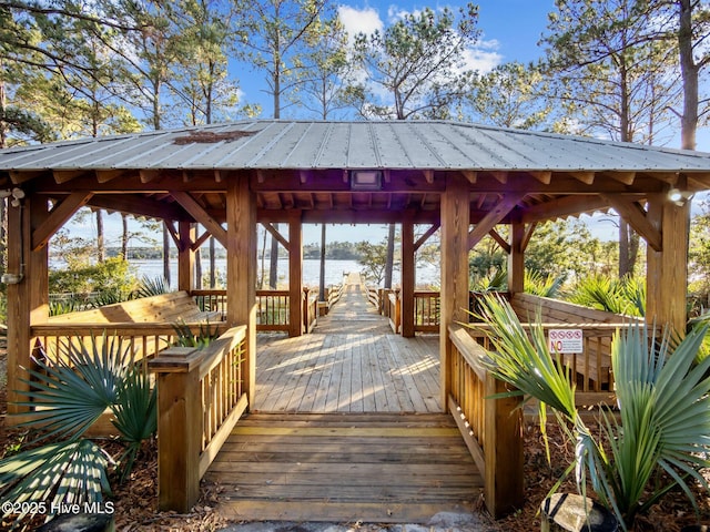 exterior space with a gazebo and a water view