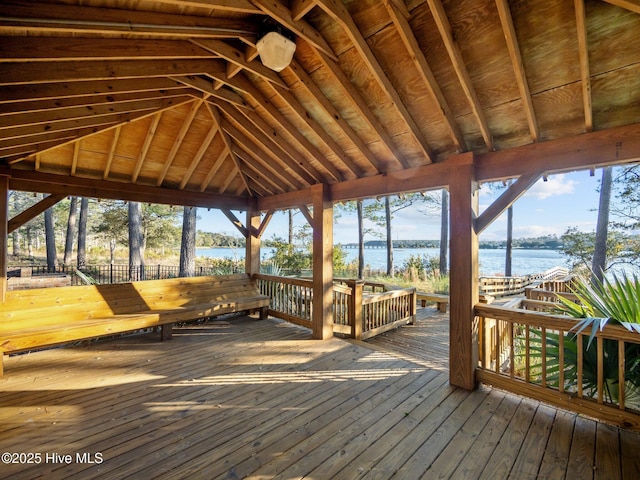 exterior space featuring a gazebo and a water view