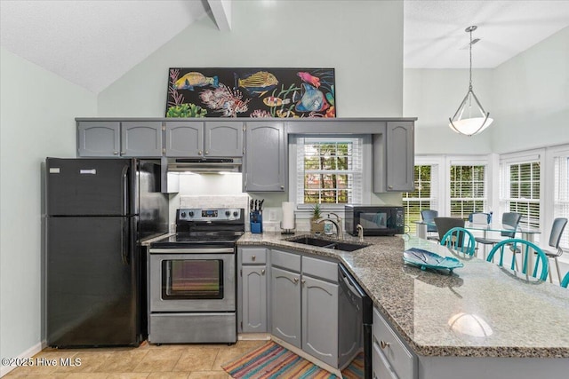 kitchen featuring gray cabinets, black appliances, lofted ceiling with beams, pendant lighting, and sink