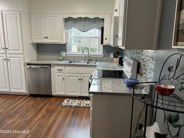 kitchen with stove, white cabinets, sink, stainless steel dishwasher, and dark hardwood / wood-style flooring