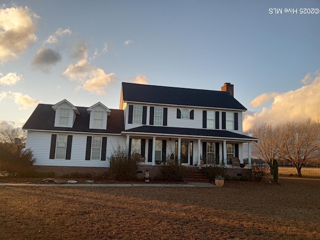 view of front of home featuring covered porch