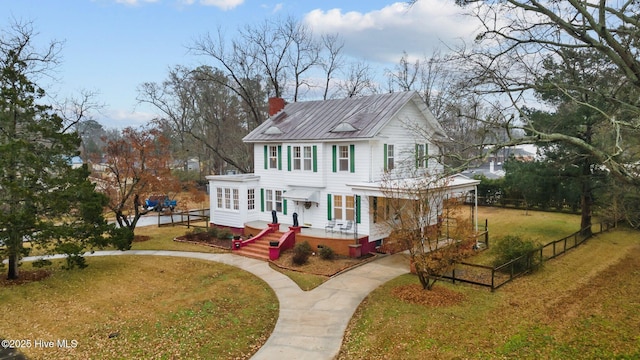 view of front of property with a front lawn