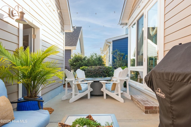 view of patio with a grill