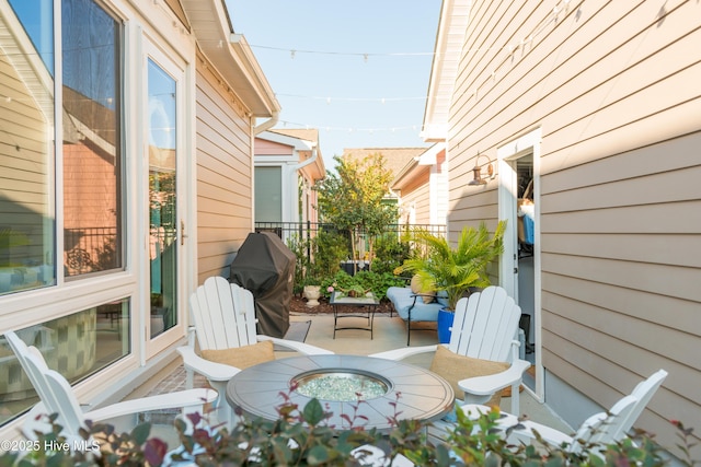 view of patio / terrace with fence and area for grilling