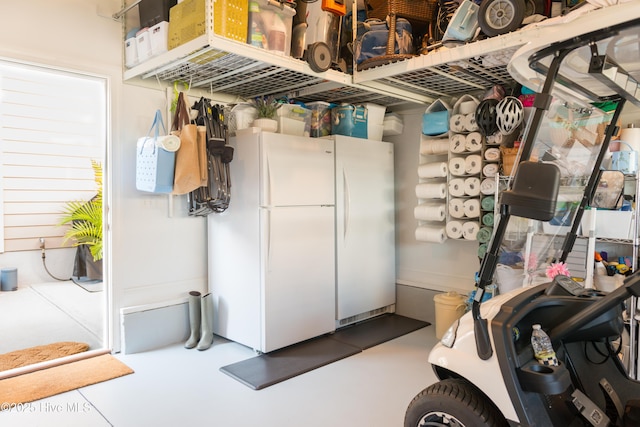 interior space featuring freestanding refrigerator