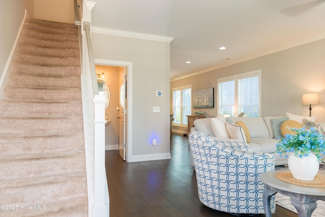 living room featuring baseboards, stairway, dark wood-style flooring, and crown molding