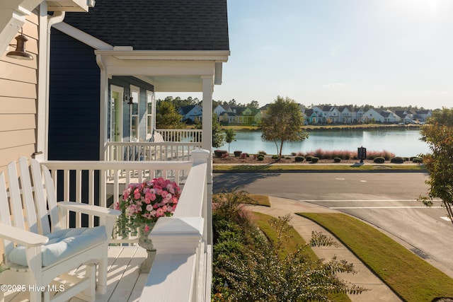 property view of water featuring a residential view