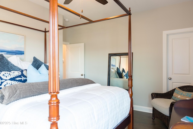 bedroom featuring dark wood-type flooring, baseboards, and a ceiling fan