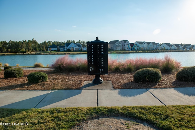 property view of water featuring a residential view