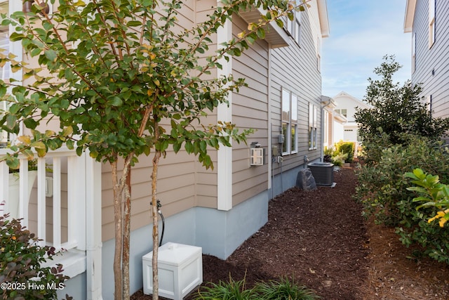 view of home's exterior with central air condition unit