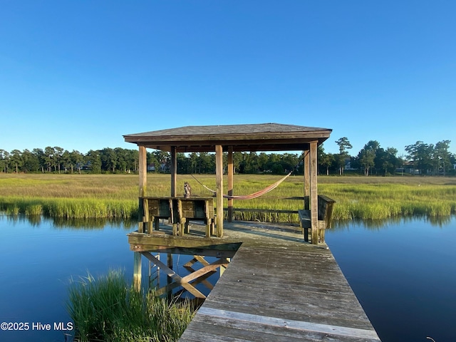 view of dock with a water view