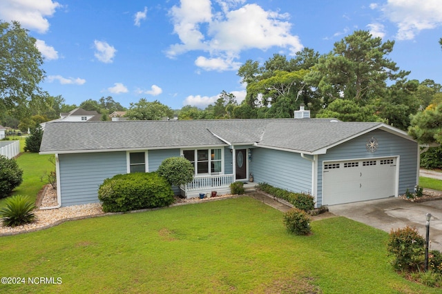 ranch-style home with a porch, a garage, and a front lawn