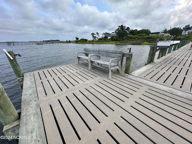 view of dock with a water view