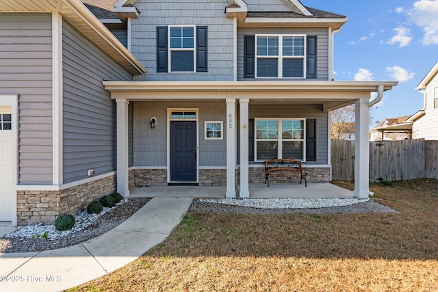 property entrance with a porch