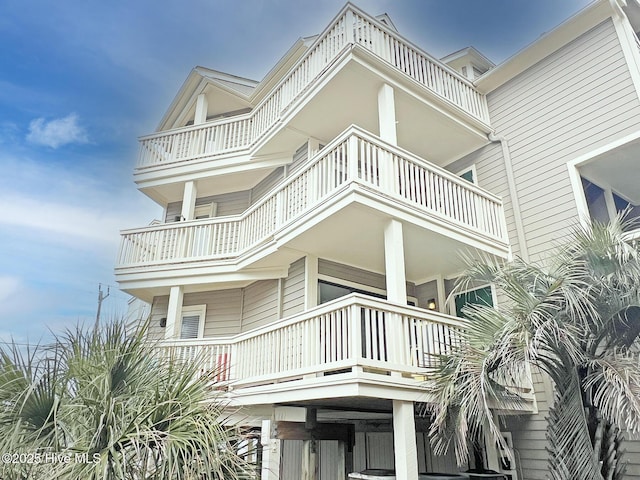 view of property exterior featuring a balcony