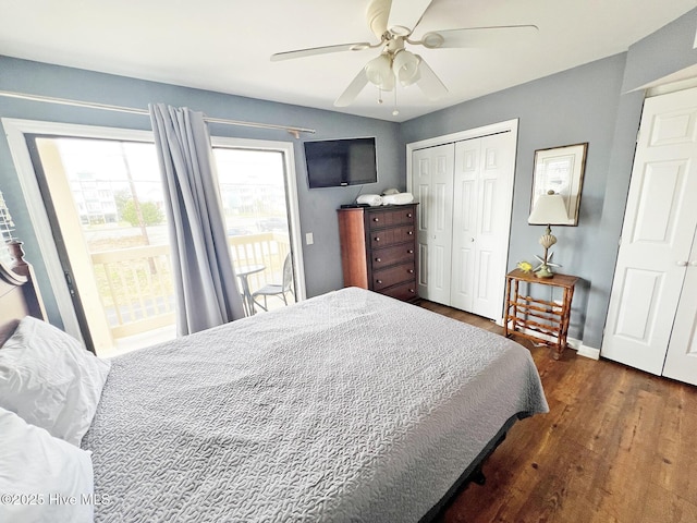 bedroom with baseboards, dark wood finished floors, a ceiling fan, access to exterior, and a closet