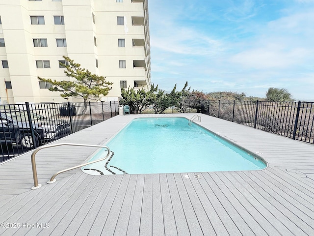 community pool with fence