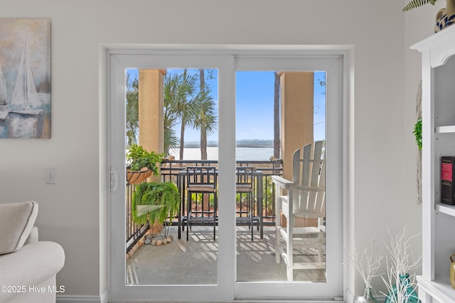 doorway featuring a water view