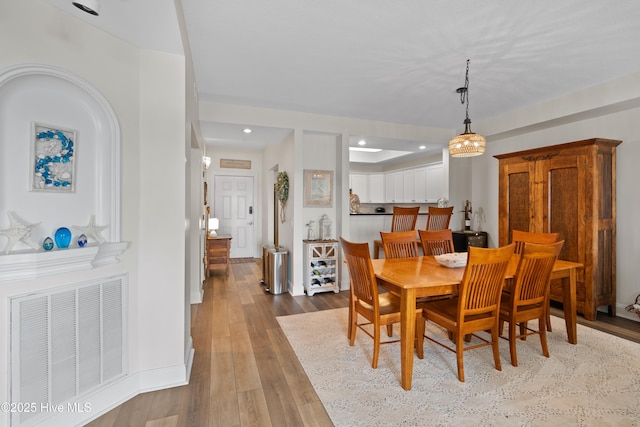 dining room featuring light wood-type flooring