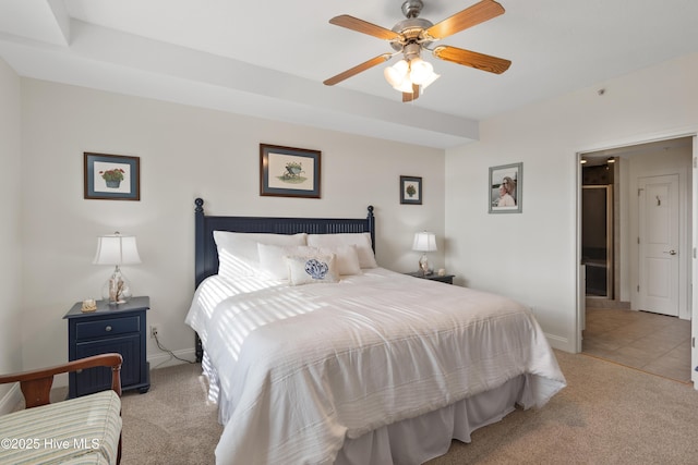 bedroom featuring ceiling fan and light colored carpet