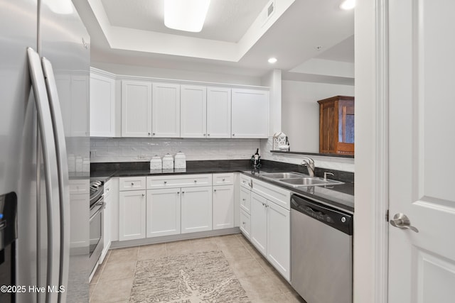 kitchen featuring white cabinets, sink, and stainless steel appliances